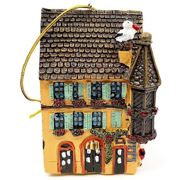 Orangefarbenes Elsässisches Turmhaus mit Storch und LED-Leuchte