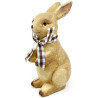 Ceramic rabbit standing with raffia