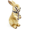 Ceramic rabbit standing with raffia