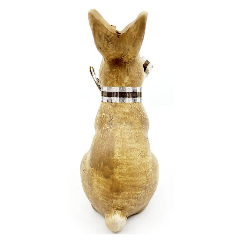 Ceramic rabbit standing with raffia