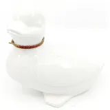 Sitzende Ente aus Keramik, Kopf nach links mit Schleife