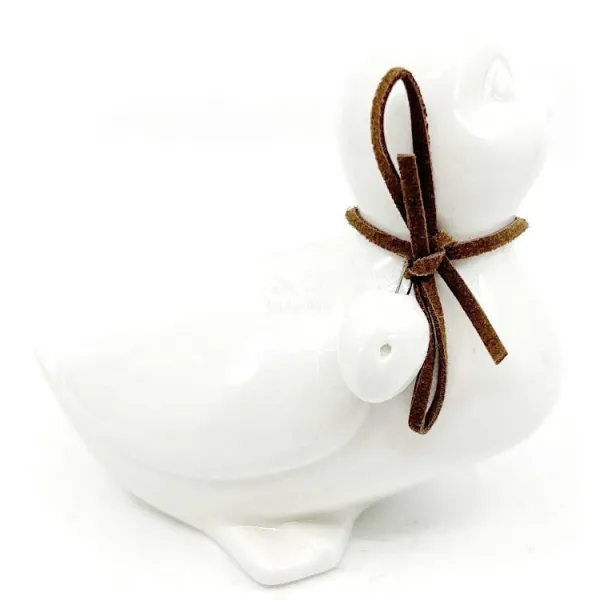 Ceramic Duck sitting head left with bow