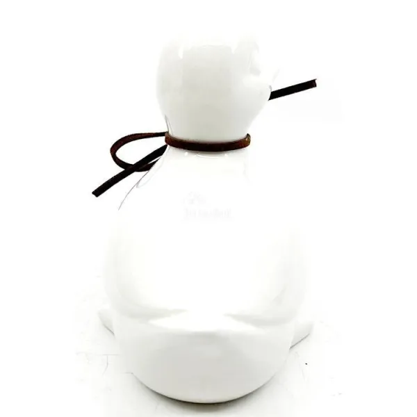 Ceramic Duck sitting head right with bow