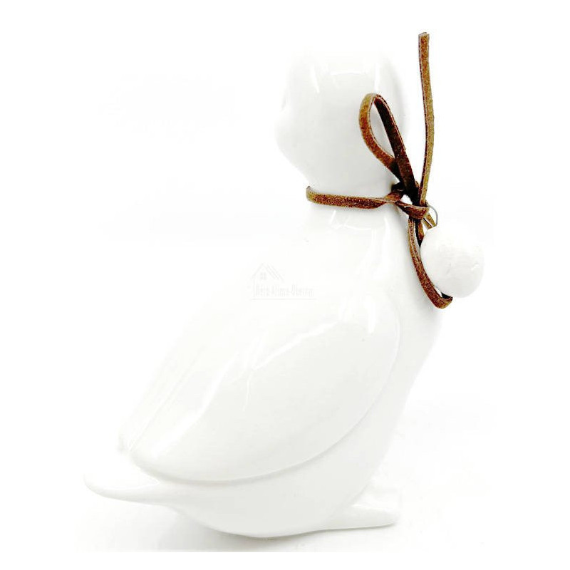 Ceramic Duck standing with head to the right with bow