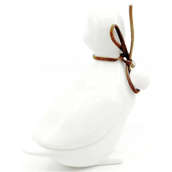 Ceramic Duck standing with head to the right with bow