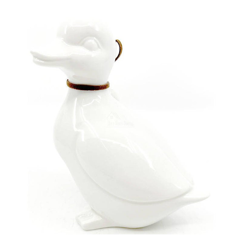 Ceramic Duck standing with head to the right with bow