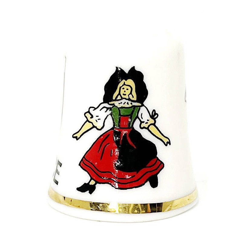 Ceramic thimble with Alsatian coat of arms, stork and Alsatian woman