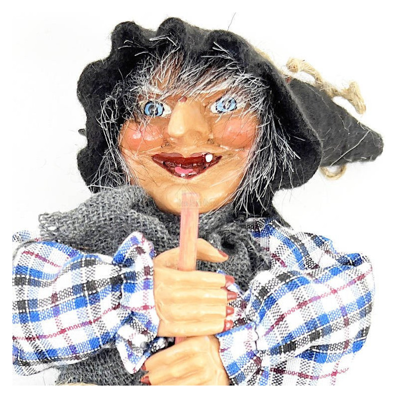 Hanging Alsatian Witch with blue dress and holly 32 cm