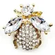 Broche Fantaisie doré insecte volant garnie de Strass