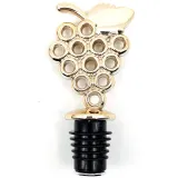 Golden wine stopper with bunch of grapes