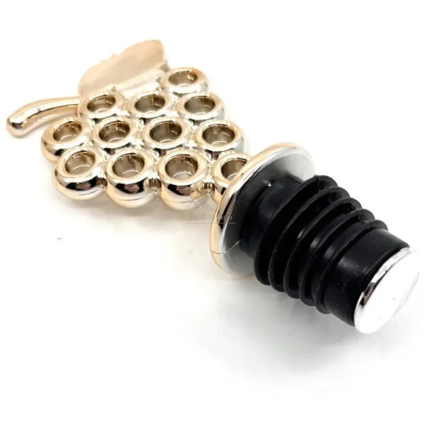 Golden wine stopper with bunch of grapes