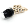 Golden wine stopper with bunch of grapes