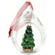 Transparent glass Christmas bauble with fir tree