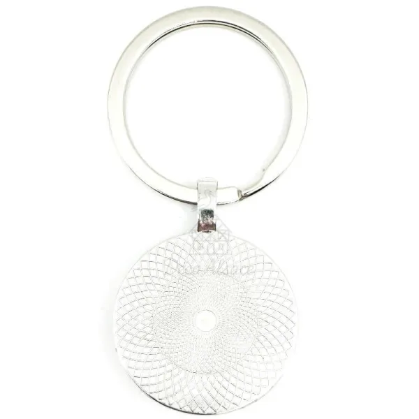 Porte Clé Cigogne en vol sur fusée