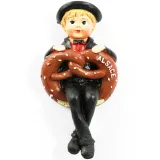 Alsatian pendant light sitting in a pretzel