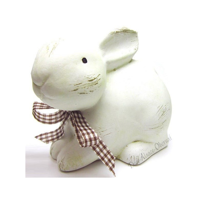 Lapin blanc avec son noeud décoratif assis en Céramique