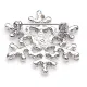 Broche Fantaisie argentée forme Flocon de Neige sertie de Strass