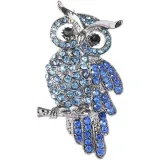 Silver fancy brooch owl on branch set with blue rhinestones