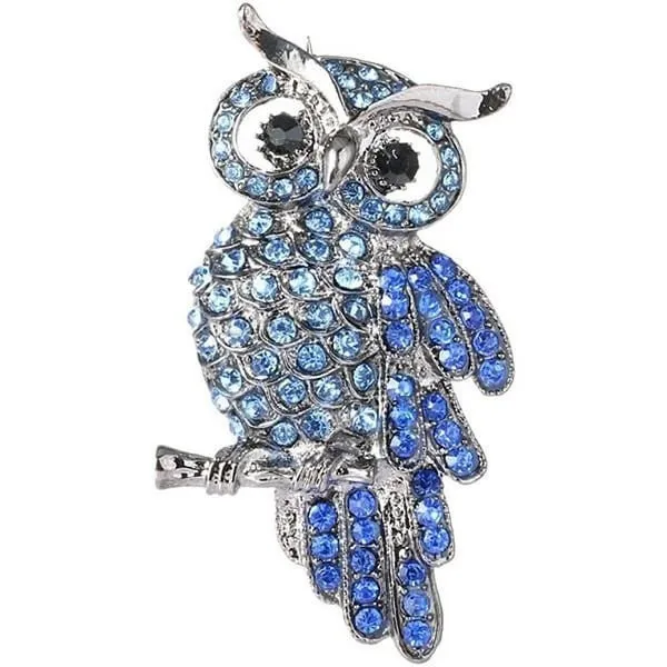 Silver fancy brooch owl on branch set with blue rhinestones