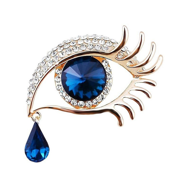 Golden fancy brooch in the shape of an eye set with rhinestones