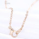 Collier avec fermoir et Pendentif Bretzel d'Alsace doré