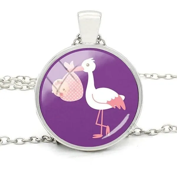 Necklace with Pendant with Curved Glass Purple background and Alsatian Stork