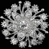 Silver fancy flower shape brooch set with rhinestones