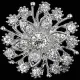 Broche Fantaisie argentée forme Fleurs sertie de Strass