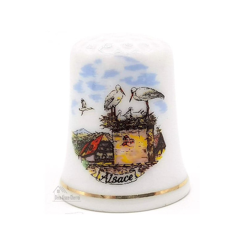 Dé à Coudre en Porcelaine décor Nid de Cigogne et Village d'Alsace