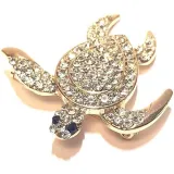Golden brooch Fancy Turtle shape set with white rhinestones