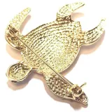 Golden brooch Fancy Turtle shape set with white rhinestones