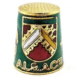 Green Collection thimble in gold plated metal with crest stork and Alsatian