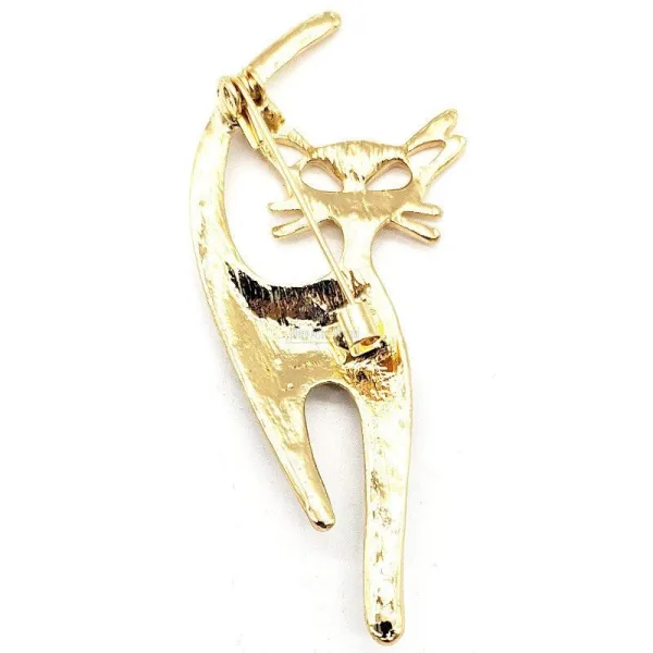 Fancy golden brooch in the shape of a cat set with white rhinestones
