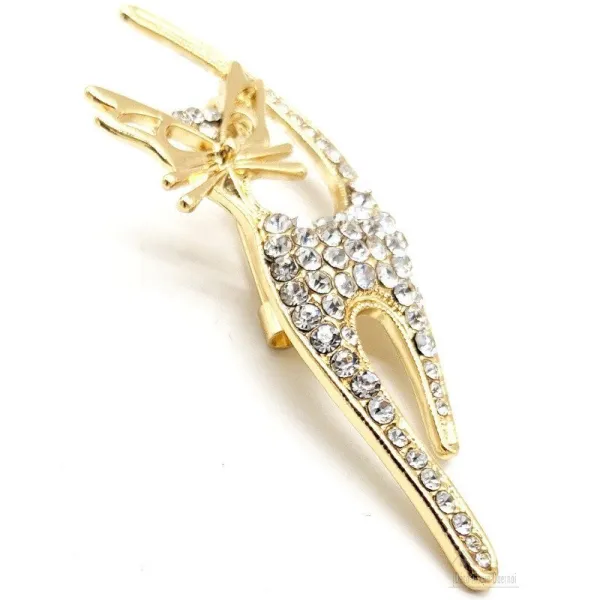 Fancy golden brooch in the shape of a cat set with white rhinestones