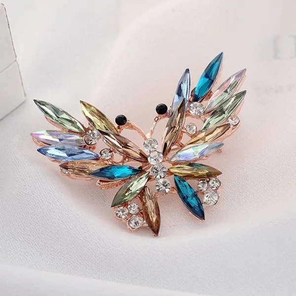 Fancy flying Butterfly shape gold brooch set with Rhinestone