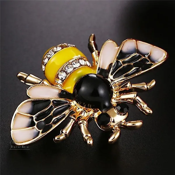 Broche dorée Fantaisie Abeille volante sertie de Strass