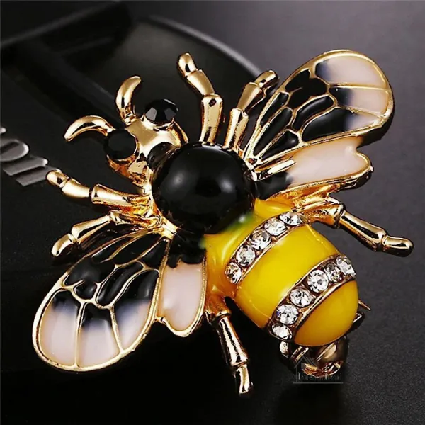 Broche dorée Fantaisie Abeille volante sertie de Strass