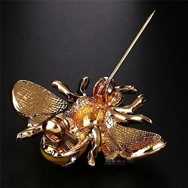 Broche dorée Fantaisie Abeille volante sertie de Strass