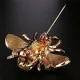 Broche dorée Fantaisie Abeille volante sertie de Strass