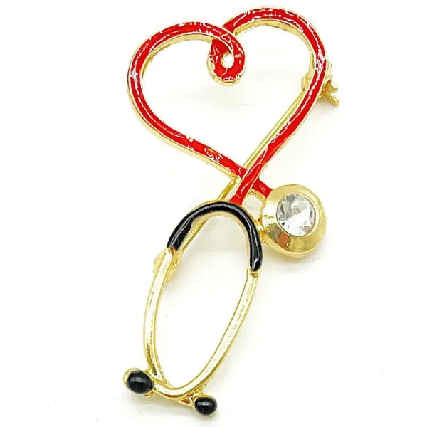 Broche dorée Fantaisie Stéthoscope avec Coeur Médecin sertie de Strass