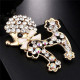Broche Fantaisie métal doré Caniche avec Noeud