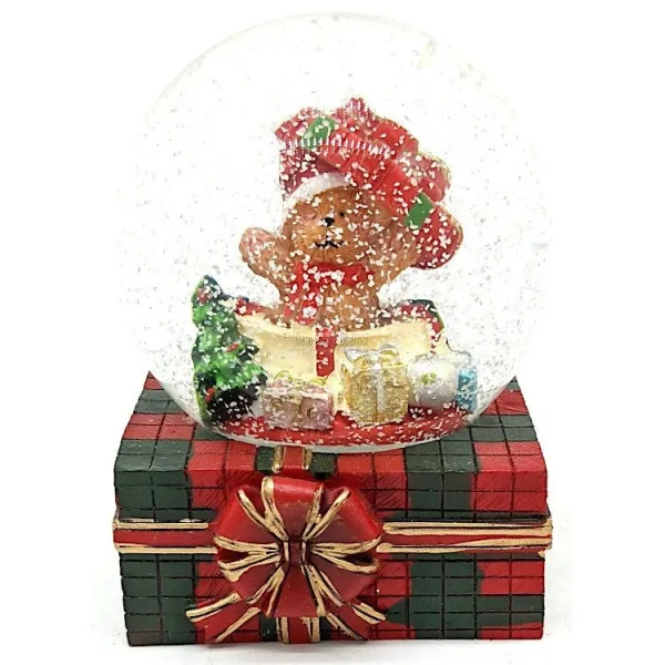 Große Schneekugel mit Teddybär und Geschenken