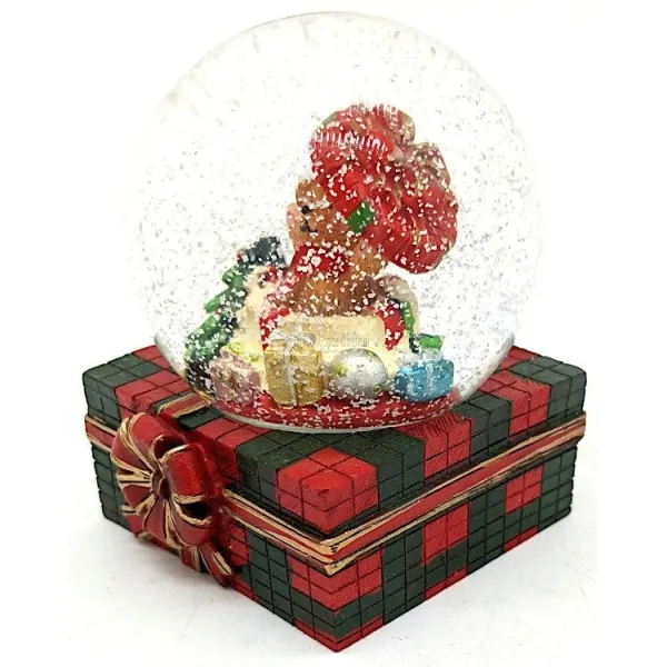 Große Schneekugel mit Teddybär und Geschenken