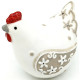 Decorated white ceramic hen
