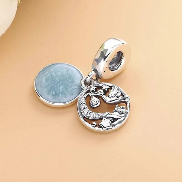 Pendentif Breloque Cigognes sur fond Bleu