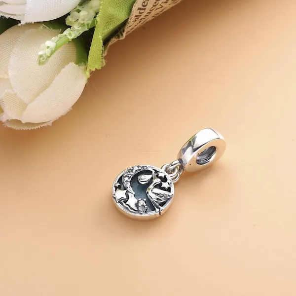 Pendant Charm Storks on Blue Background