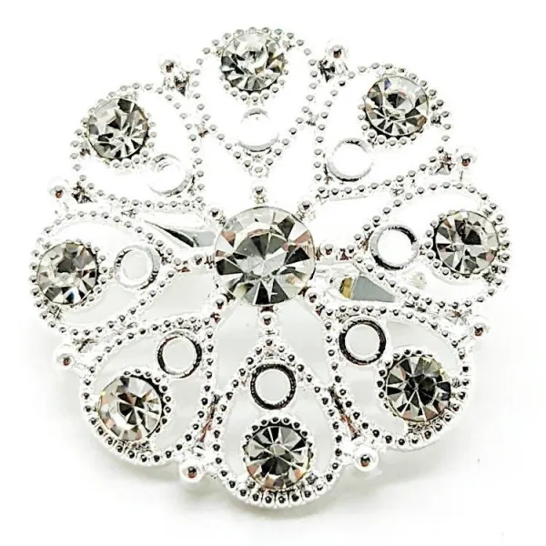 Broche Fantaisie argentée motif floral sertie de Strass