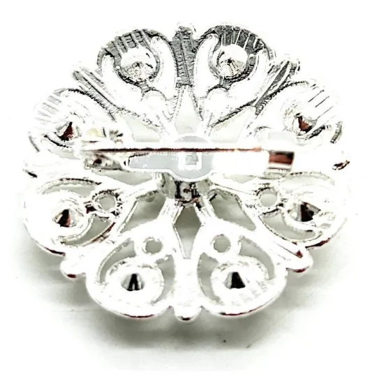 Zilveren Fantasiebroche met bloemenmotief bezet met Strass