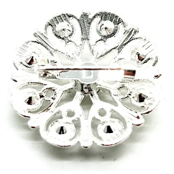 Broche Fantaisie argentée motif floral sertie de Strass