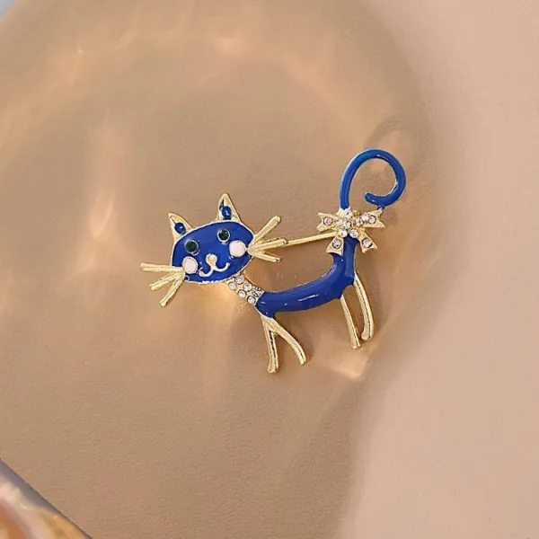 Broche Fantaisie métal dorée Chat bleu et Strass